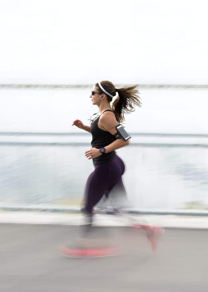 woman running wearing bracelet